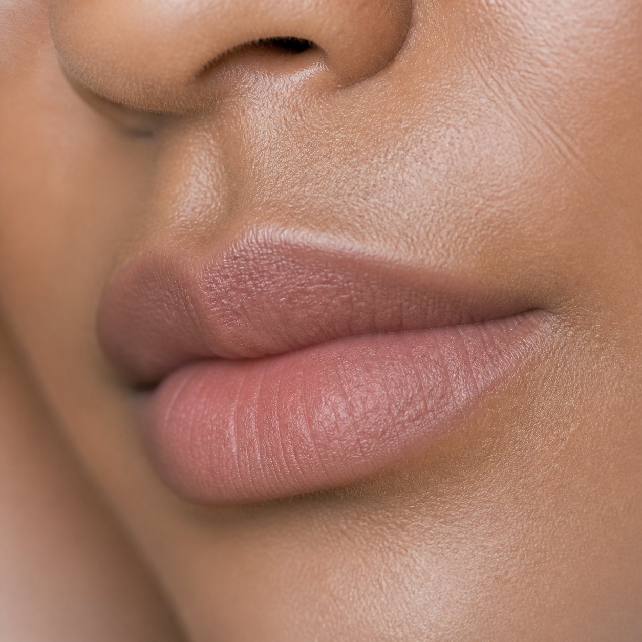 Macro detail of lips with a natural tint